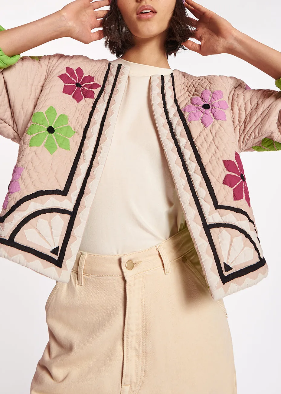 Off-white quilted jacket with flower patches