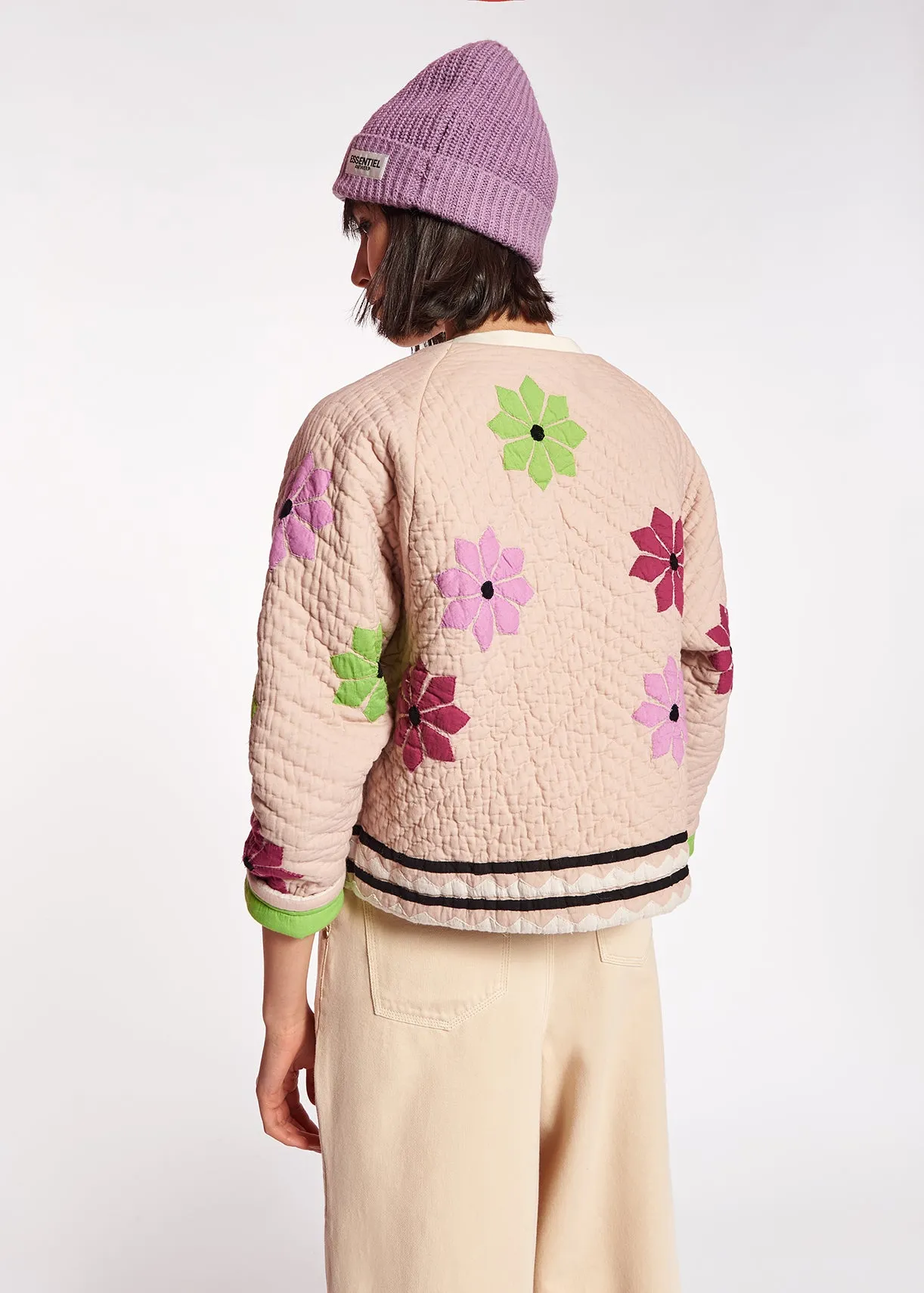 Off-white quilted jacket with flower patches