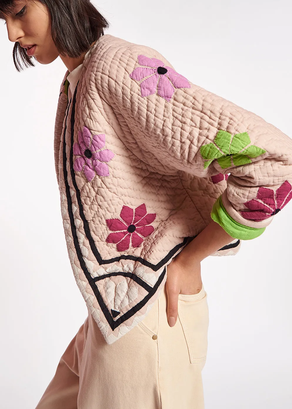 Off-white quilted jacket with flower patches